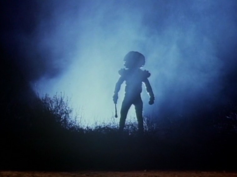 Here's one of the aliens. He's supported by an odd robot thing