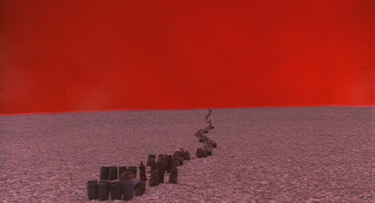 Don't try figuring out why this bizarre red planet features. It gets explained in later movies