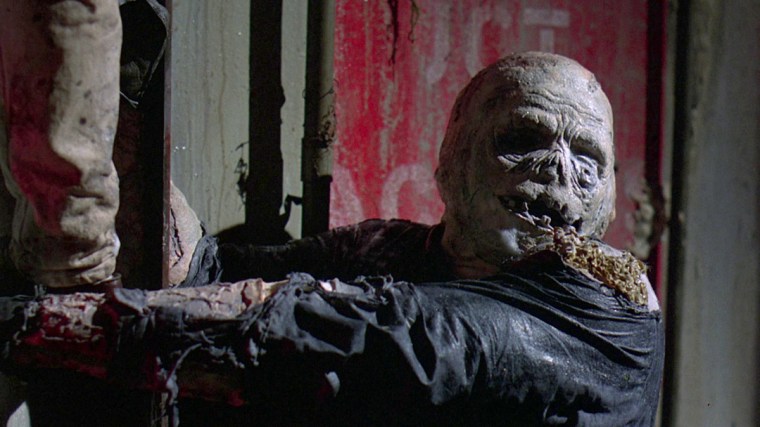 Oh, and it involves his mask coming off again for the umpteenth time in the series. We get it mate, you've got a face for radio