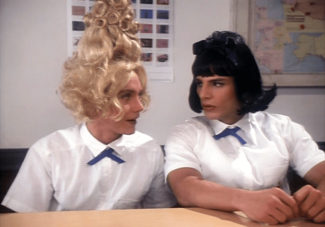 "Look Mr Mercury, I know you've done this drag thing before but I'm new to it so stop taking the piss out of my hair"