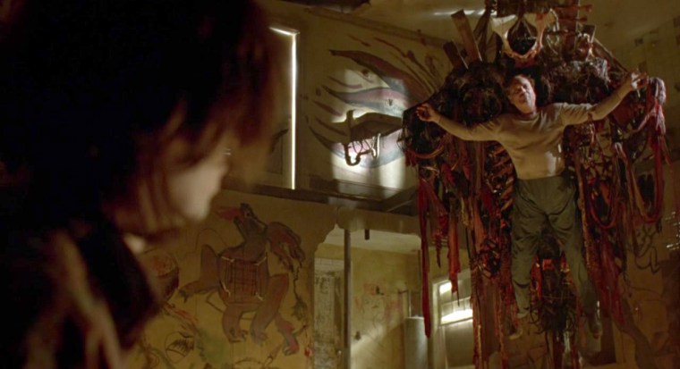 "Um, I strapped myself to this to make a dramatic entrance but if you could actually help me down that would be lovely, thanks"