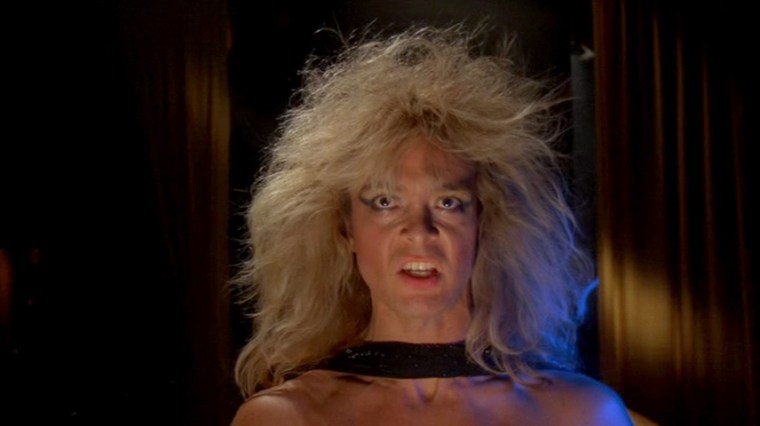 I mean, he obviously has the look. If the look is supposed to be 'a white Tina Turner'